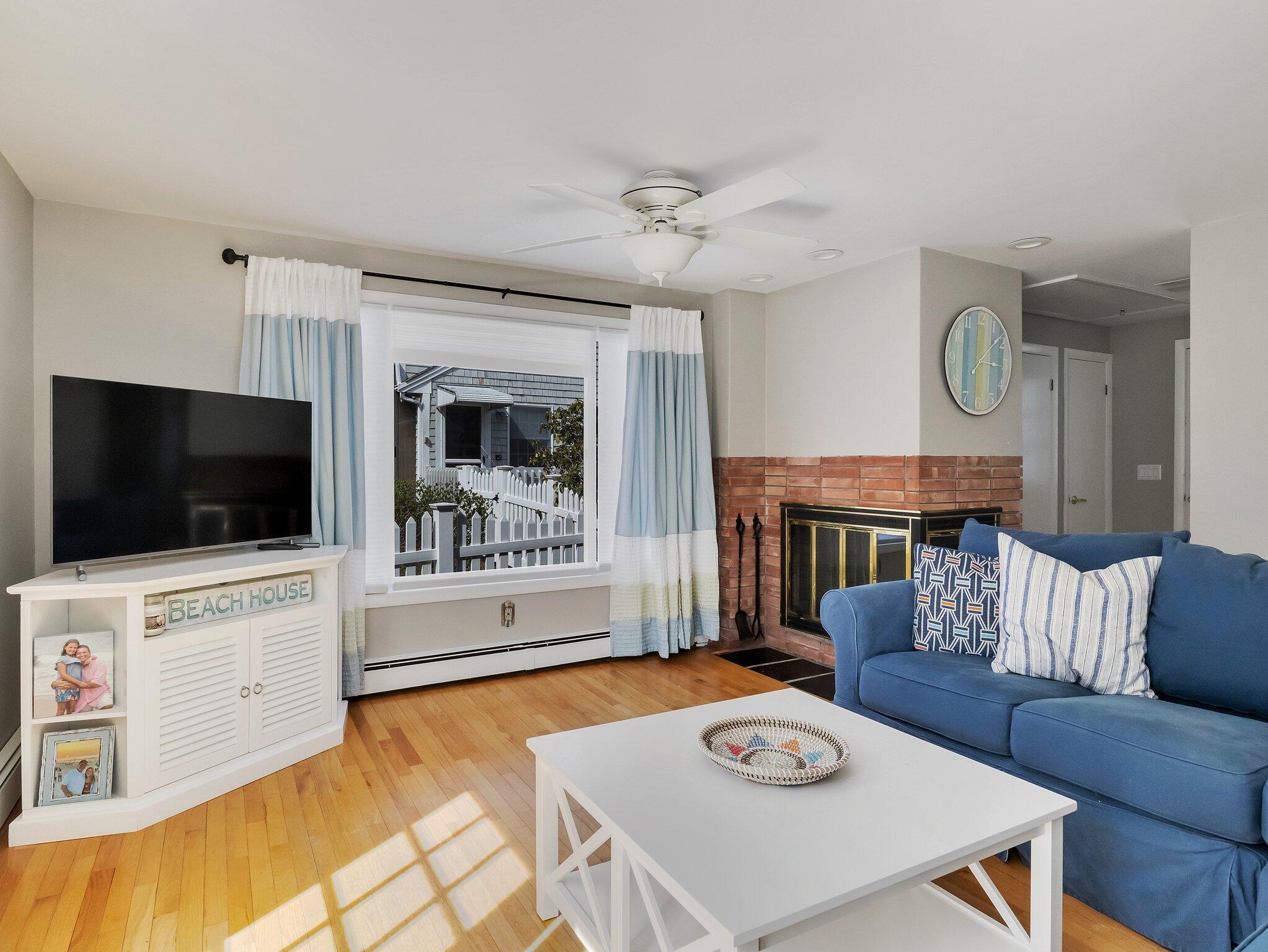 41 Harbor Road West Yarmouth, MA 02673 - Photo 22 of 56 a living room with furniture and a flat screen tv