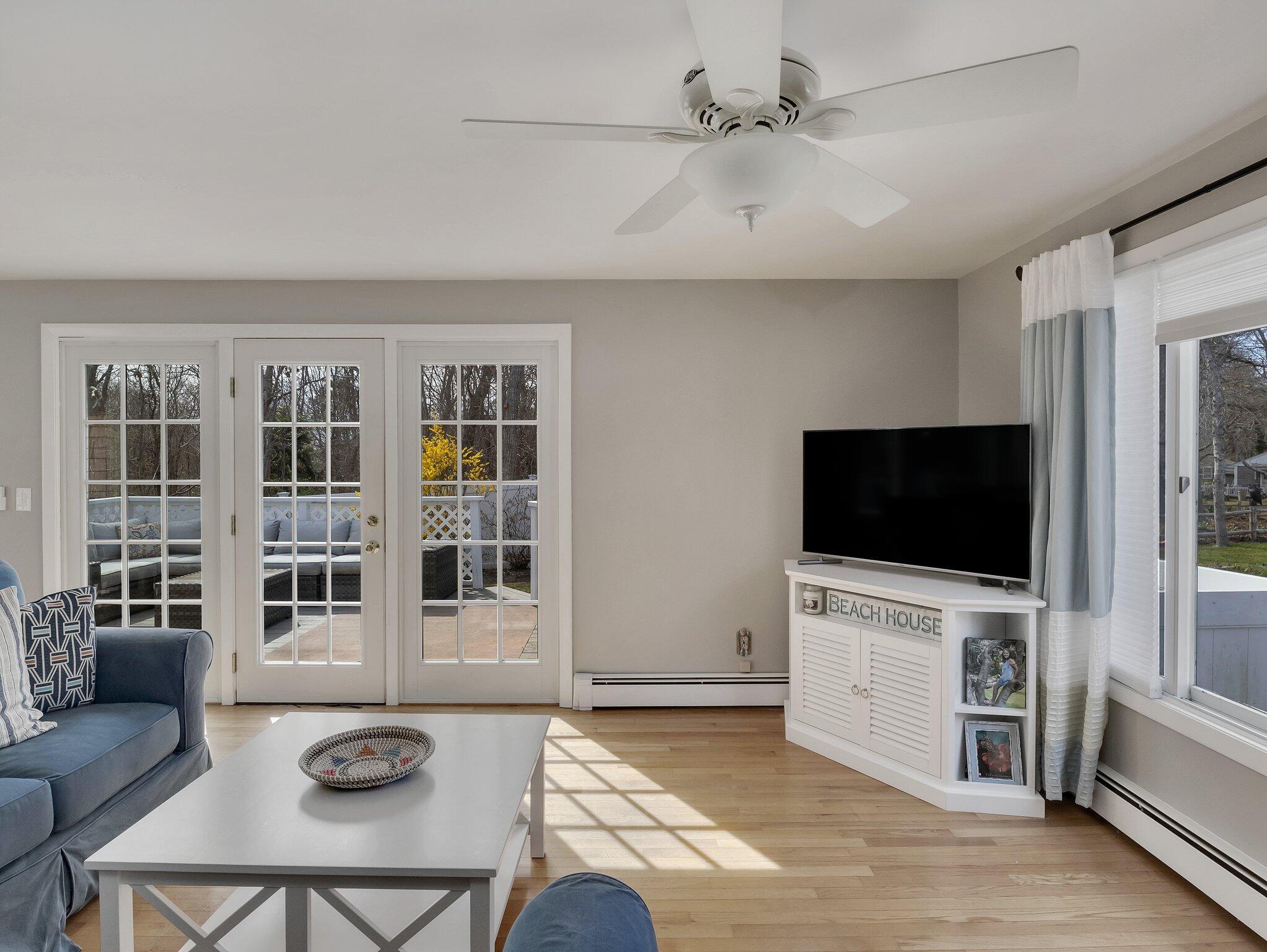 41 Harbor Road West Yarmouth, MA 02673 - Photo 24 of 56 a living room with furniture and a flat screen tv