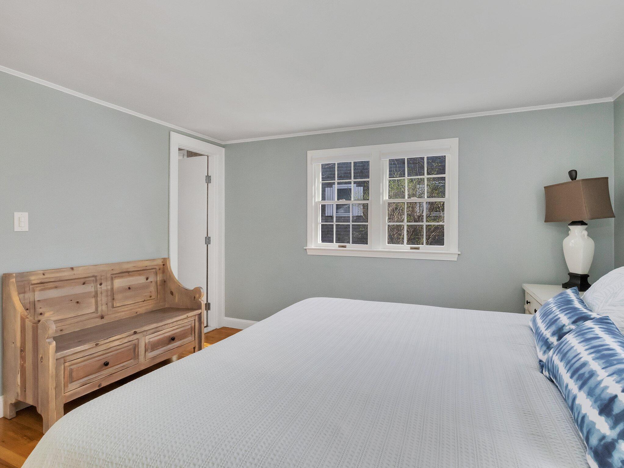 41 Harbor Road West Yarmouth, MA 02673 - Photo 26 of 56 a bedroom with a bed and a window