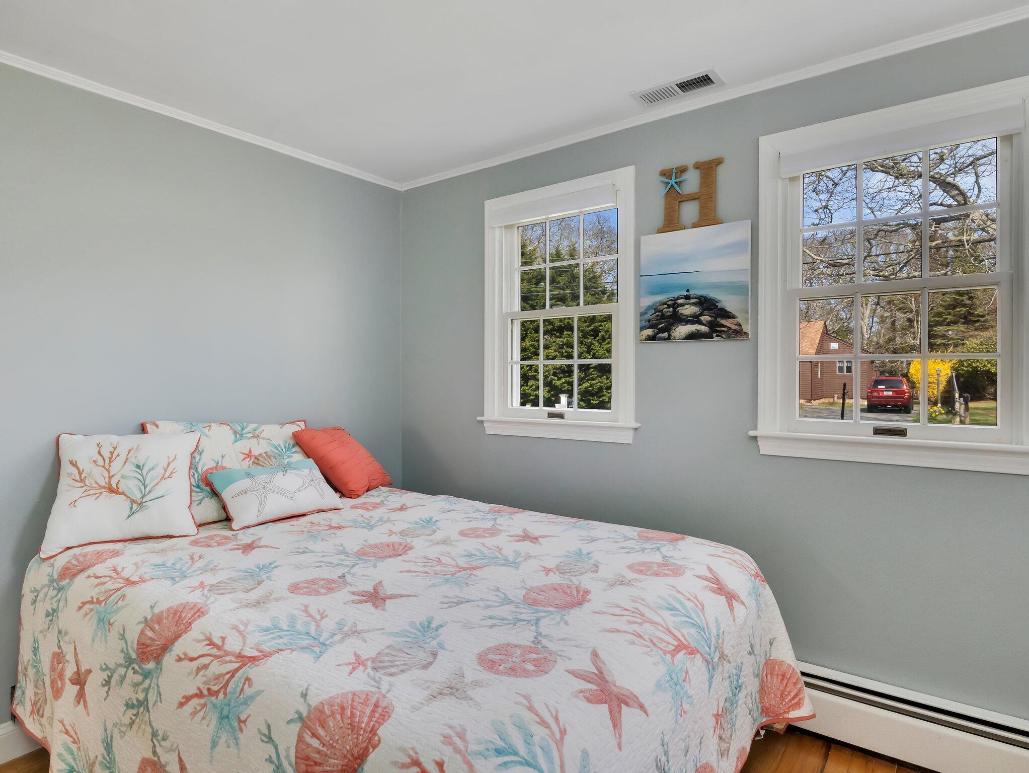 41 Harbor Road West Yarmouth, MA 02673 - Photo 29 of 56 a bedroom with a bed and a window