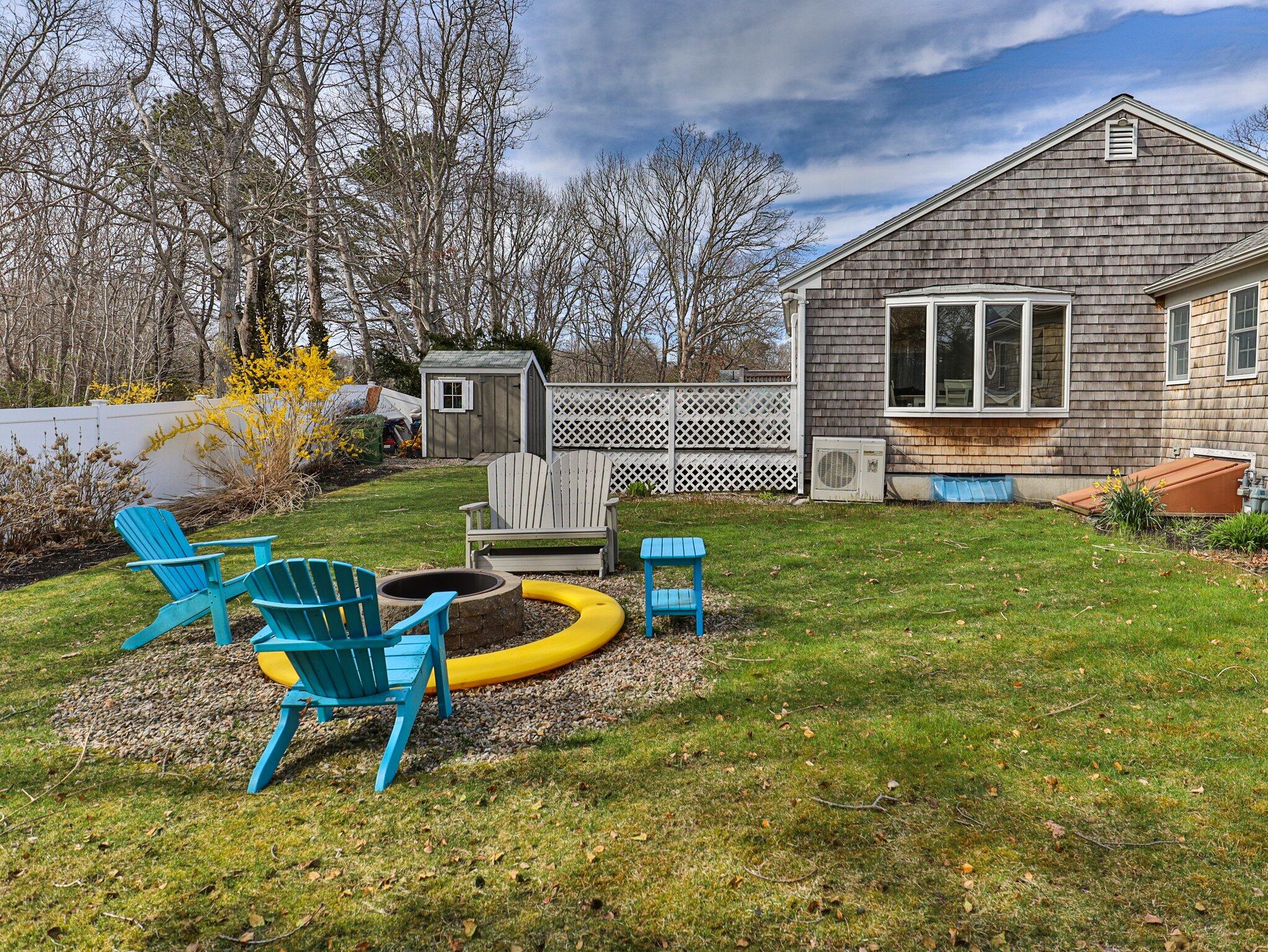 41 Harbor Road West Yarmouth, MA 02673 - Photo 36 of 56 a view of a house with backyard and sitting area