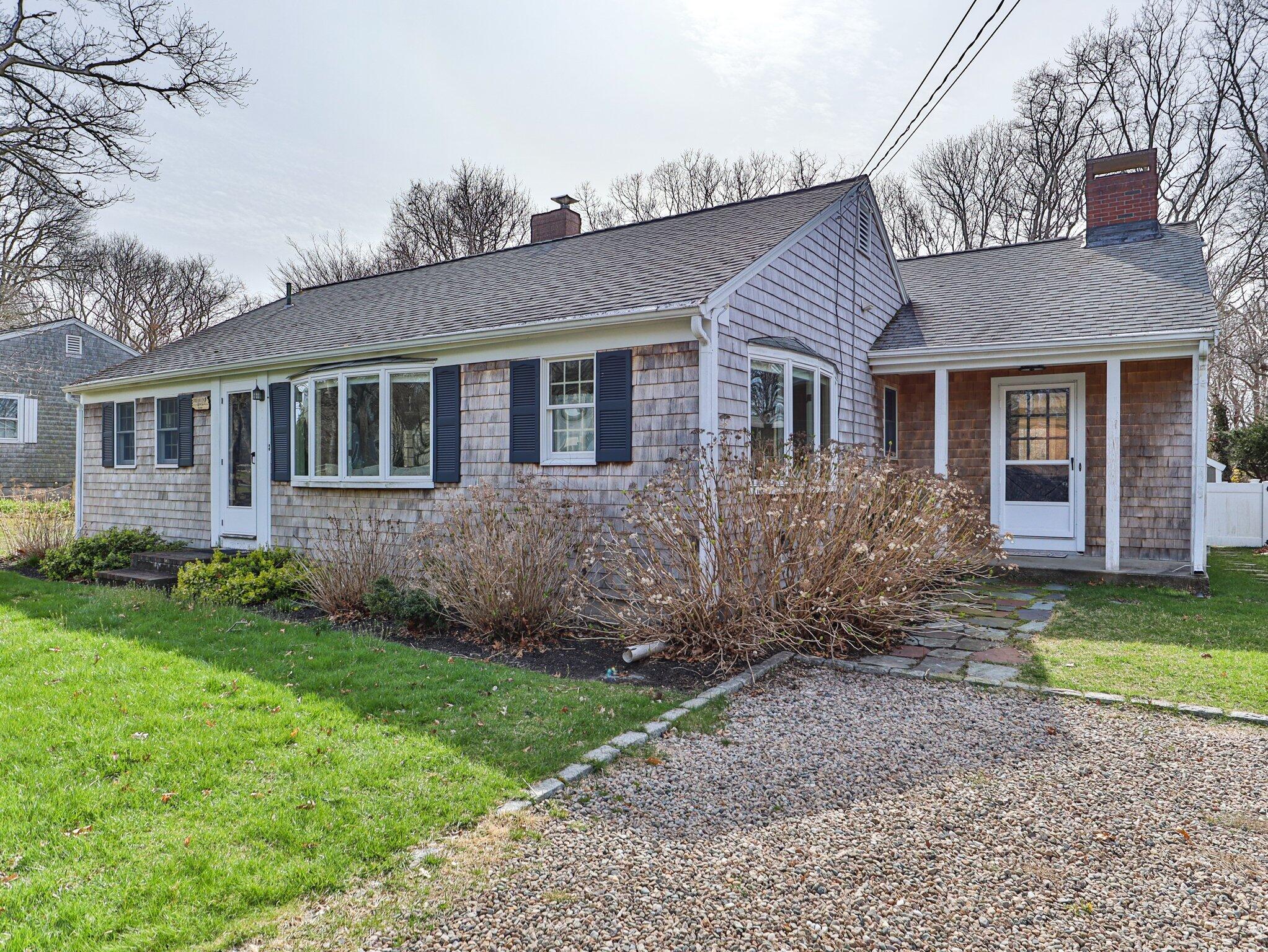 41 Harbor Road West Yarmouth, MA 02673 - Photo 48 of 56 a front view of a house with garden