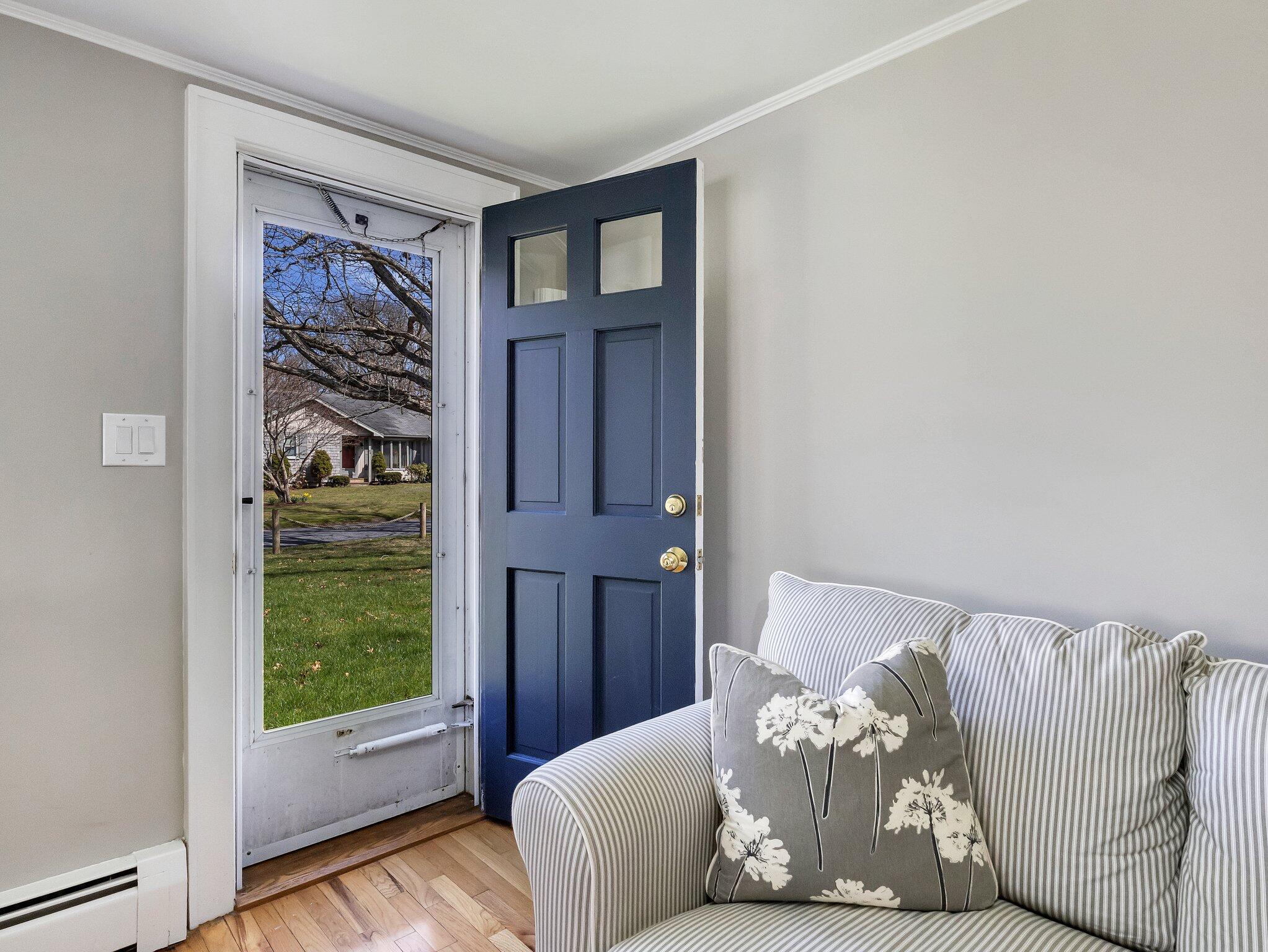 41 Harbor Road West Yarmouth, MA 02673 - Photo 7 of 56 a bed sitting in a bedroom next to a window with outside view