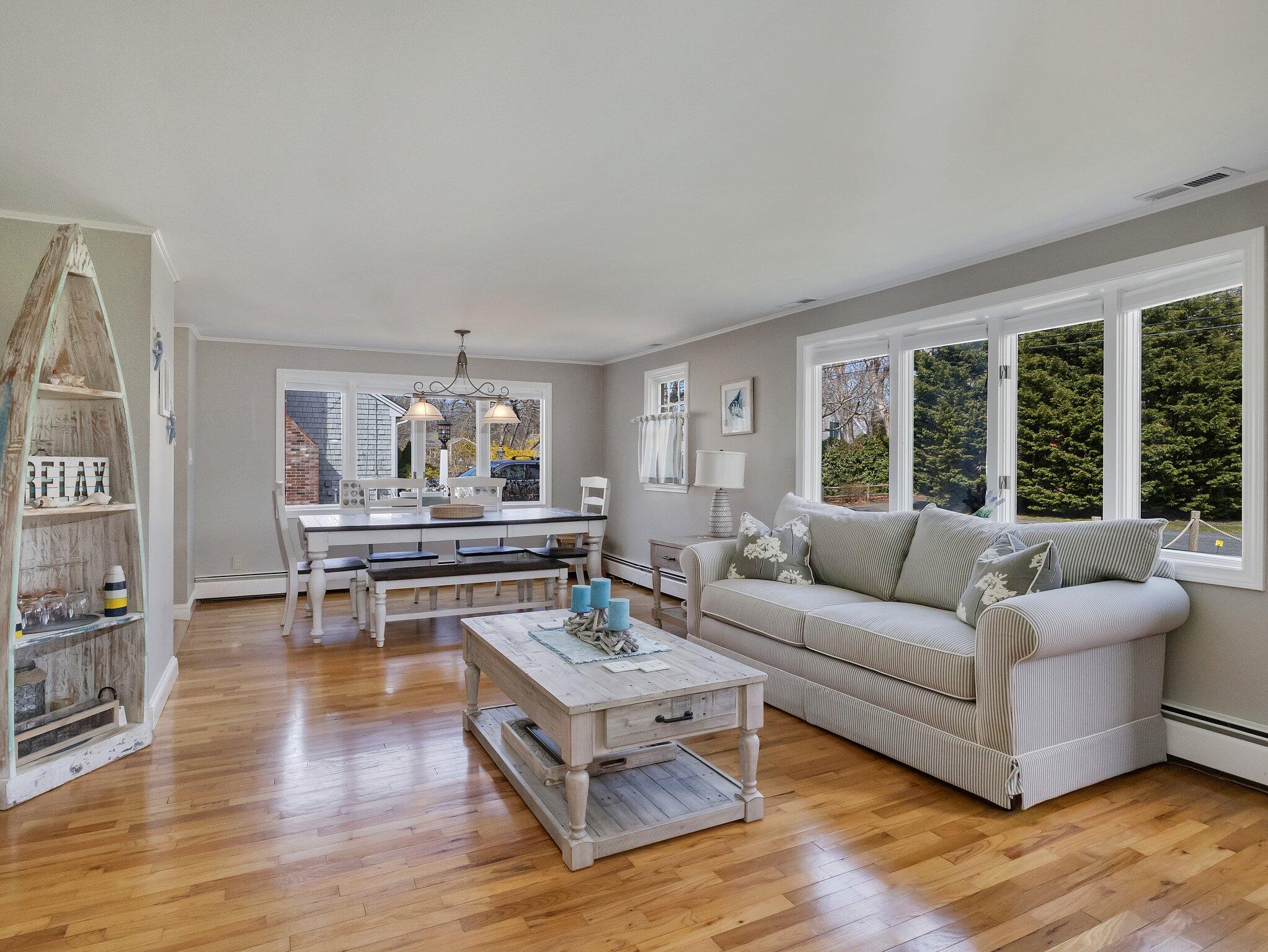 41 Harbor Road West Yarmouth, MA 02673 - Photo 9 of 56 a living room with furniture and a large window