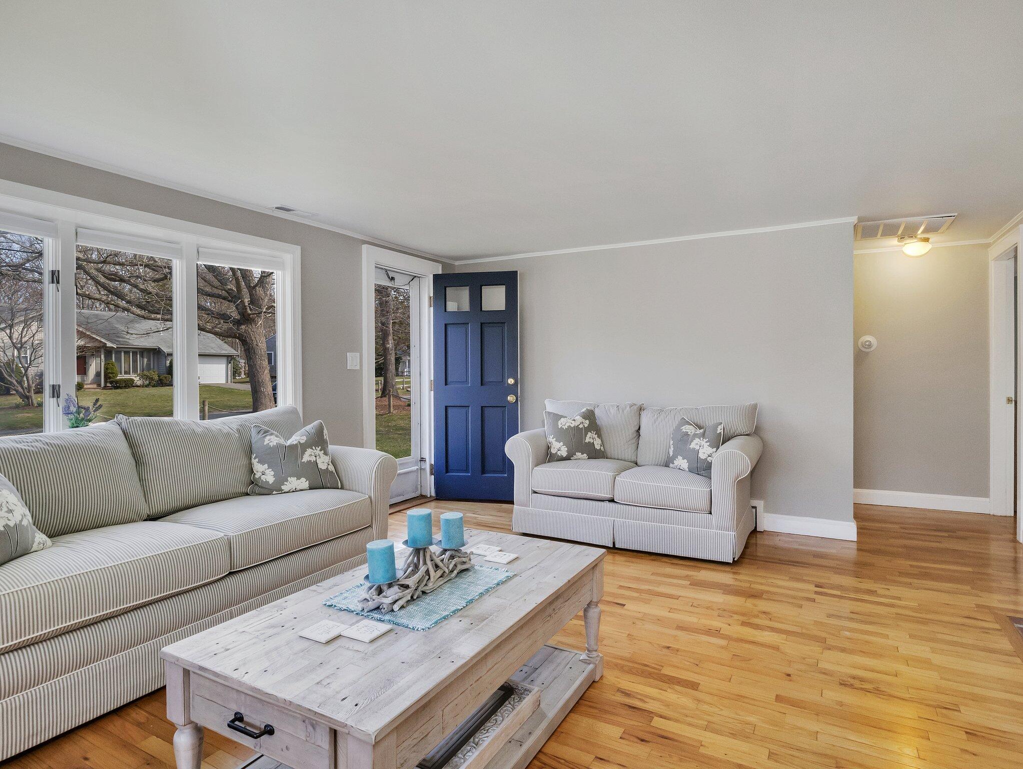 41 Harbor Road West Yarmouth, MA 02673 - Photo 10 of 56 a living room with furniture and a wooden floor