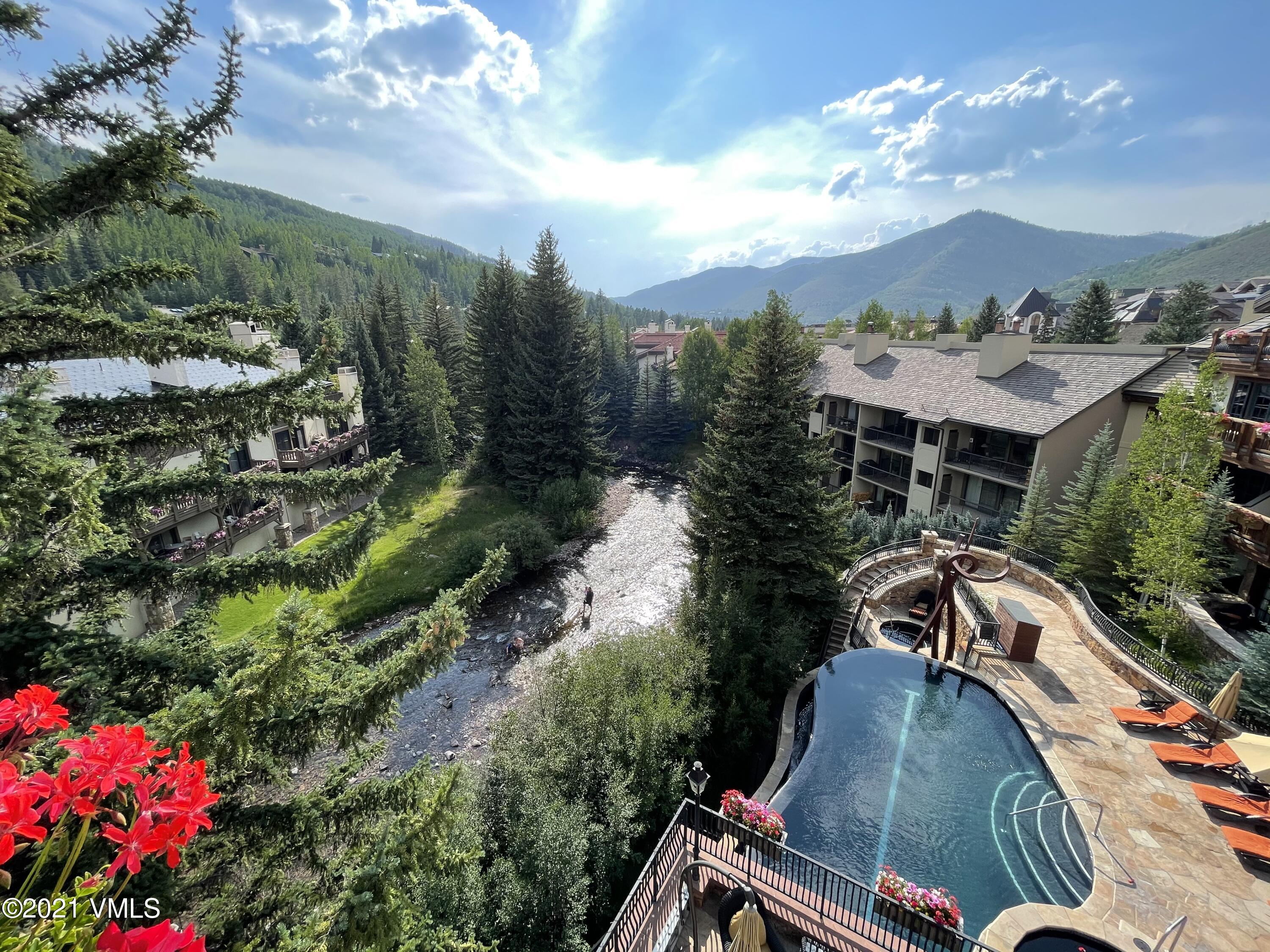 1 Willow Bridge Road, Unit 44 Vail, CO 81657 - Photo 14 of 16 a view of a houses with sky view