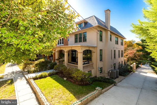a aerial view of a house with swimming pool
