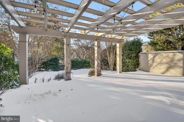a view of swimming pool with a outdoor seating
