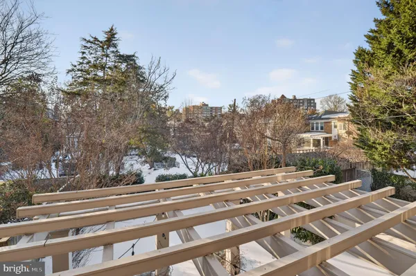 a view of a building with trees