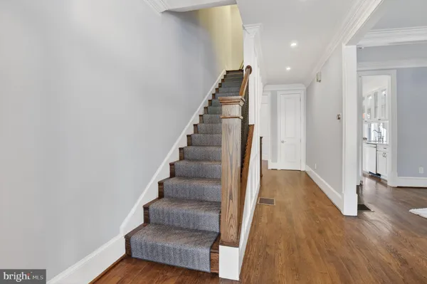 a view of entryway with wooden floor