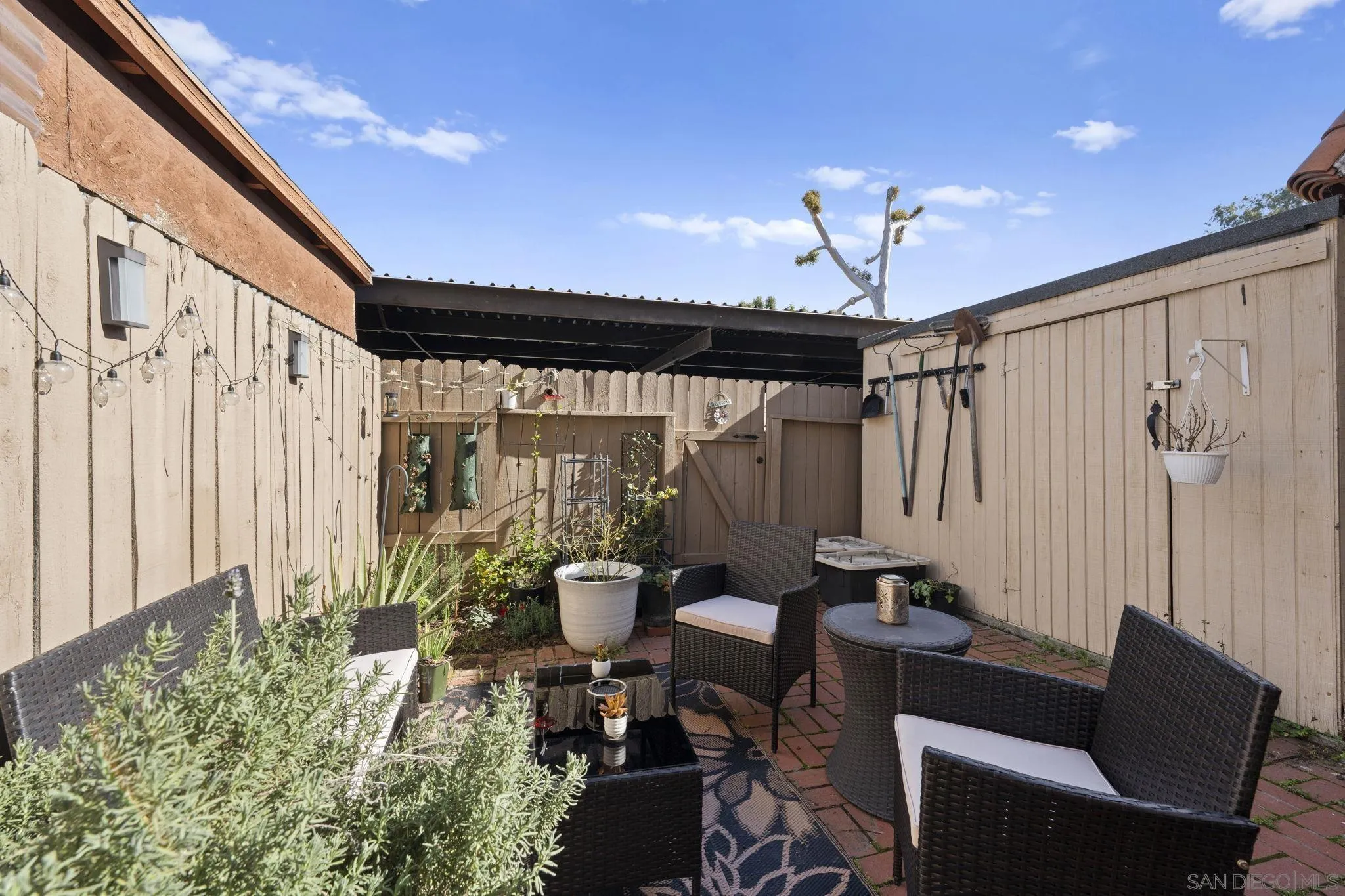 910 North Fig Street, Unit D Escondido, CA 92026 - Photo 15 of 23 a view of a livingroom with furniture and a window