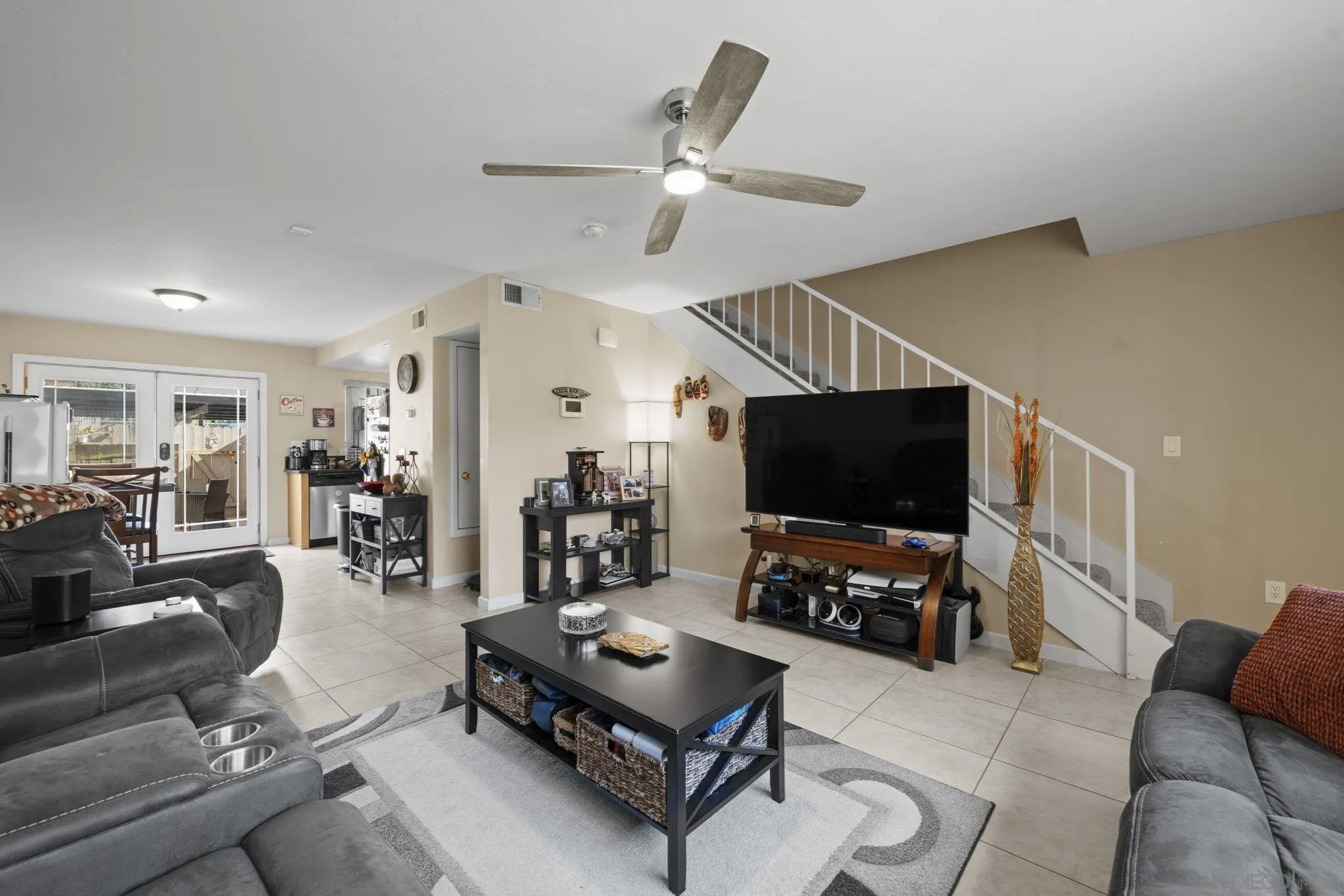 910 North Fig Street, Unit D Escondido, CA 92026 - Photo 7 of 23 a living room with furniture and a flat screen tv