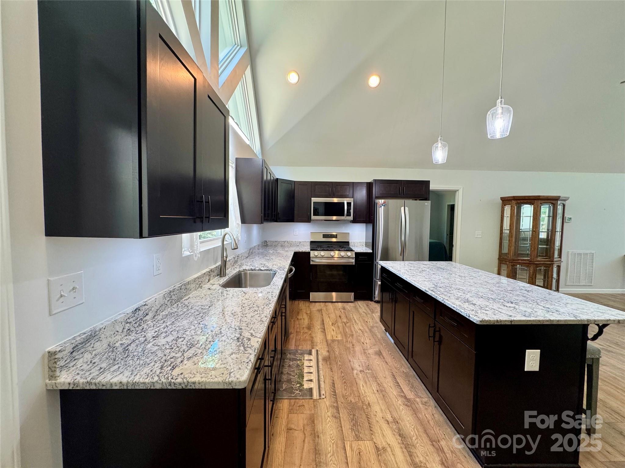 109 Beech Tree Lane Rutherfordton, NC 28139 - Photo 11 of 32 a large kitchen with granite countertop lots of counter top space