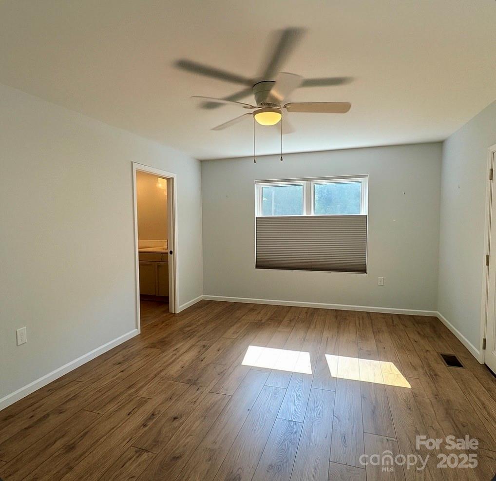 109 Beech Tree Lane Rutherfordton, NC 28139 - Photo 21 of 32 wooden floor in an empty room with a window