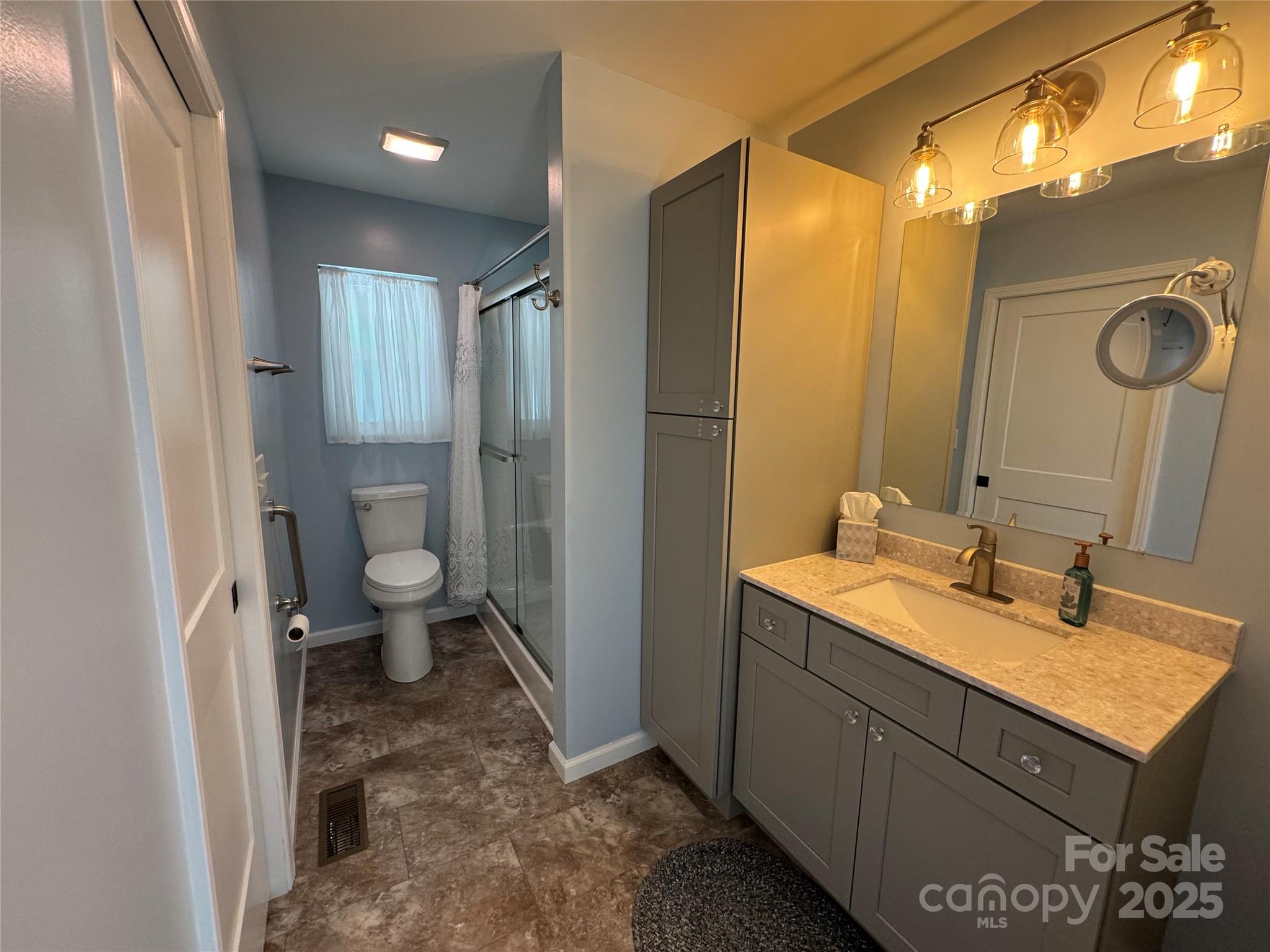 109 Beech Tree Lane Rutherfordton, NC 28139 - Photo 23 of 32 a bathroom with a sink toilet and shower