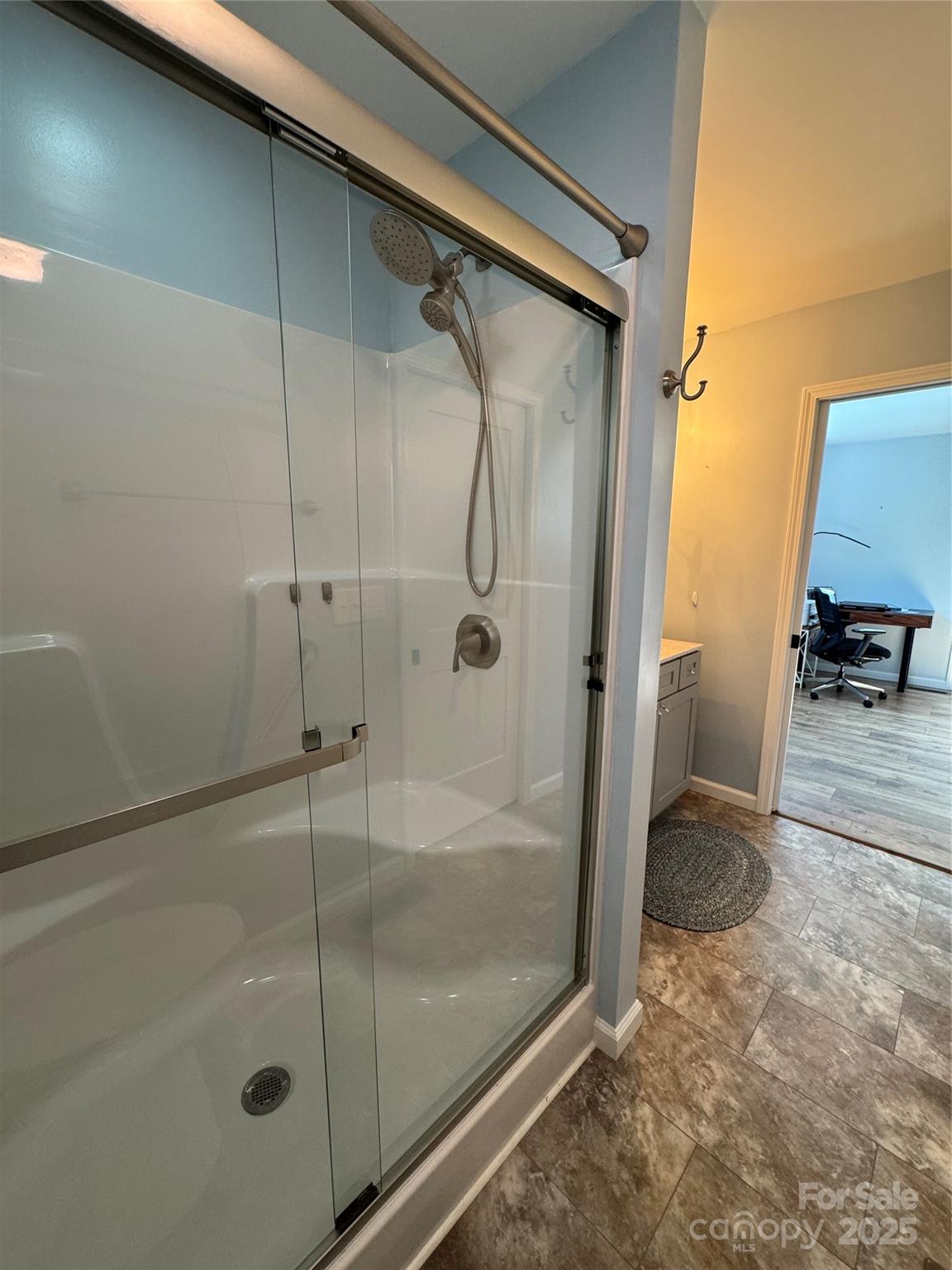109 Beech Tree Lane Rutherfordton, NC 28139 - Photo 24 of 32 a bathroom with a glass shower door