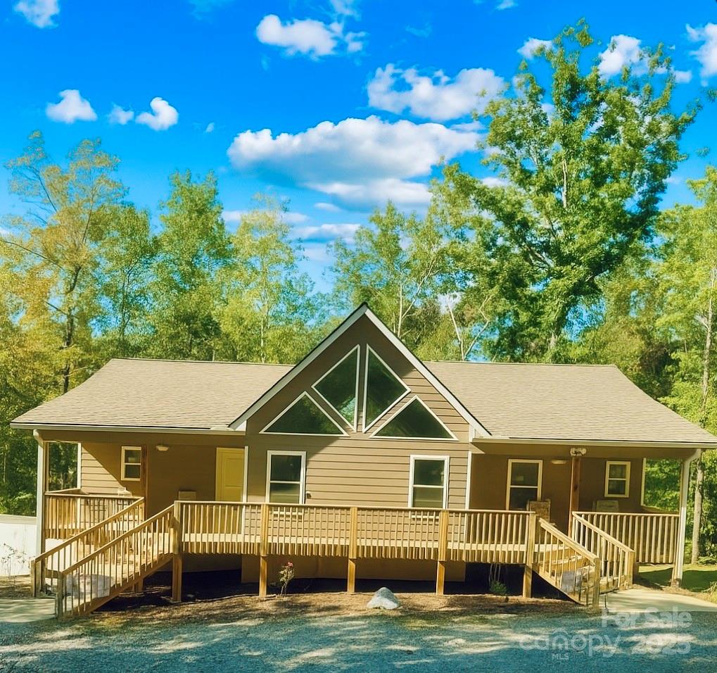 109 Beech Tree Lane Rutherfordton, NC 28139 - Photo 6 of 32 a front view of a house with a yard