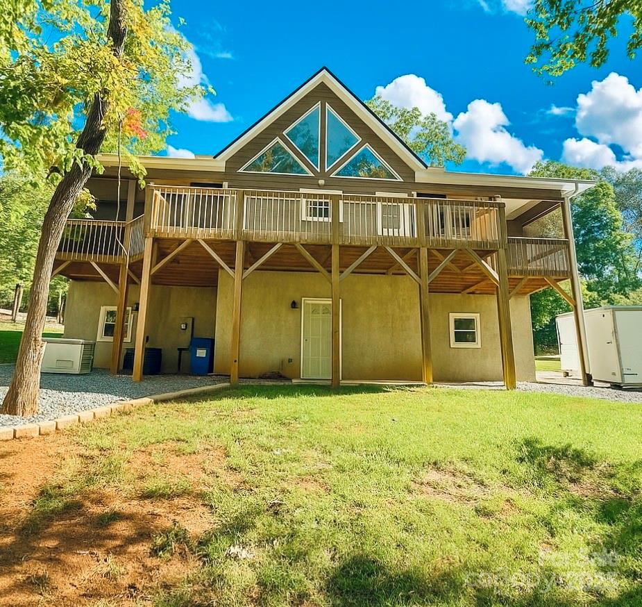 109 Beech Tree Lane Rutherfordton, NC 28139 - Photo 7 of 32 a view of a house with a yard