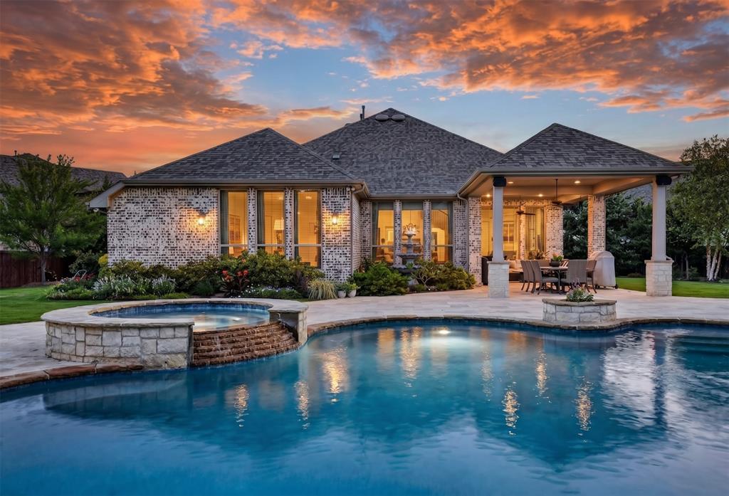 6656 Roughleaf Ridge Road Flower Mound, TX 76226 - Photo 31 of 40 a view of pool with outdoor seating