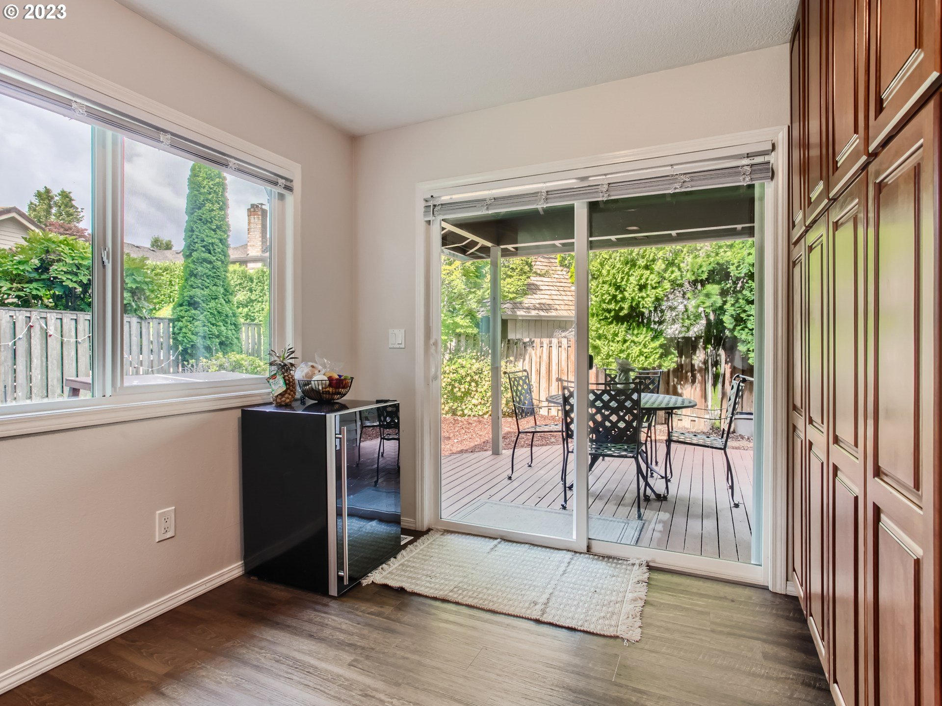 10230 Southwest Kickapoo Court Tualatin, OR 97062 - Photo 13 of 26 a view of a livingroom with furniture and hardwood floor