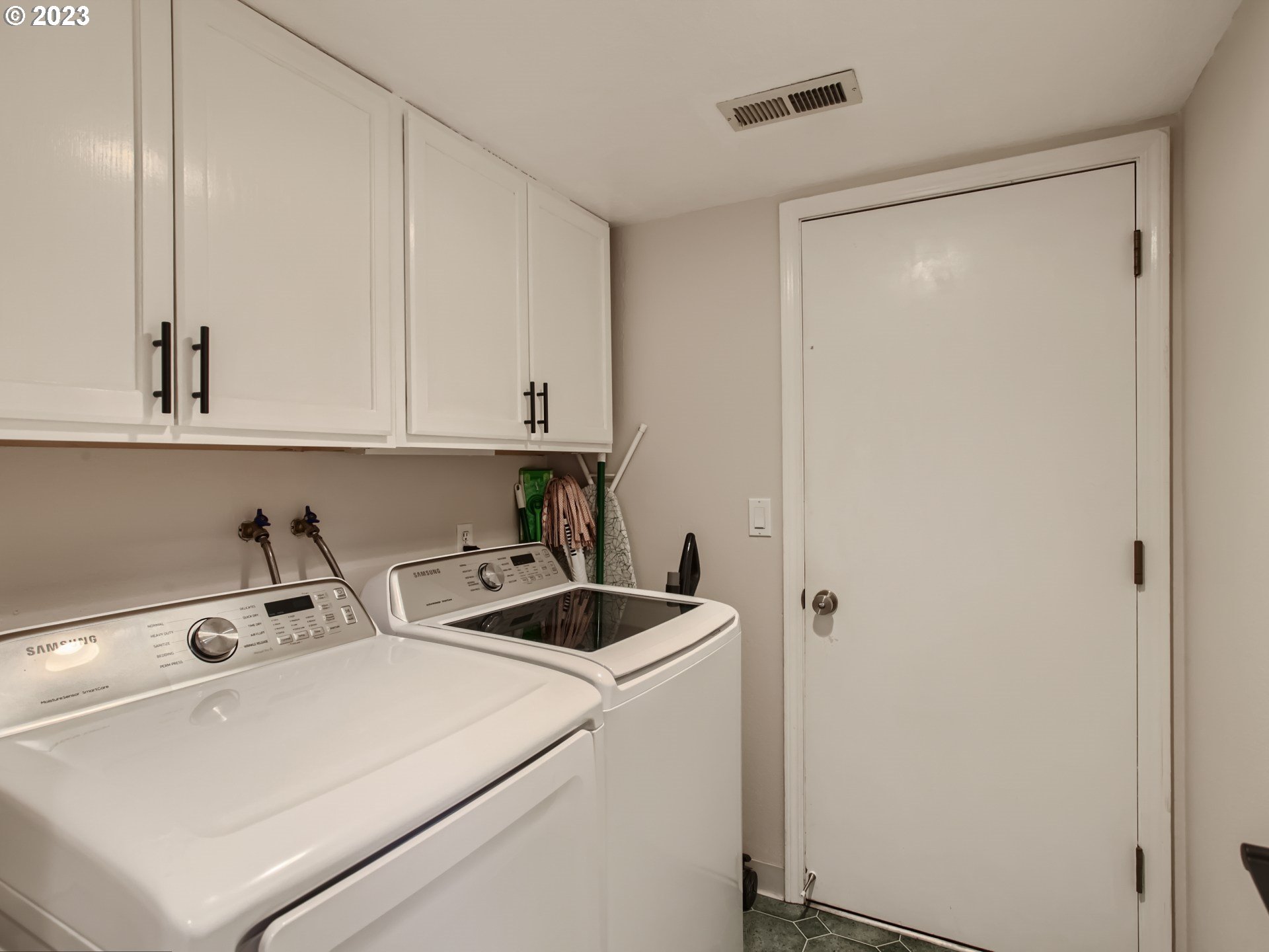 10230 Southwest Kickapoo Court Tualatin, OR 97062 - Photo 22 of 26 a utility room with dryer and washer