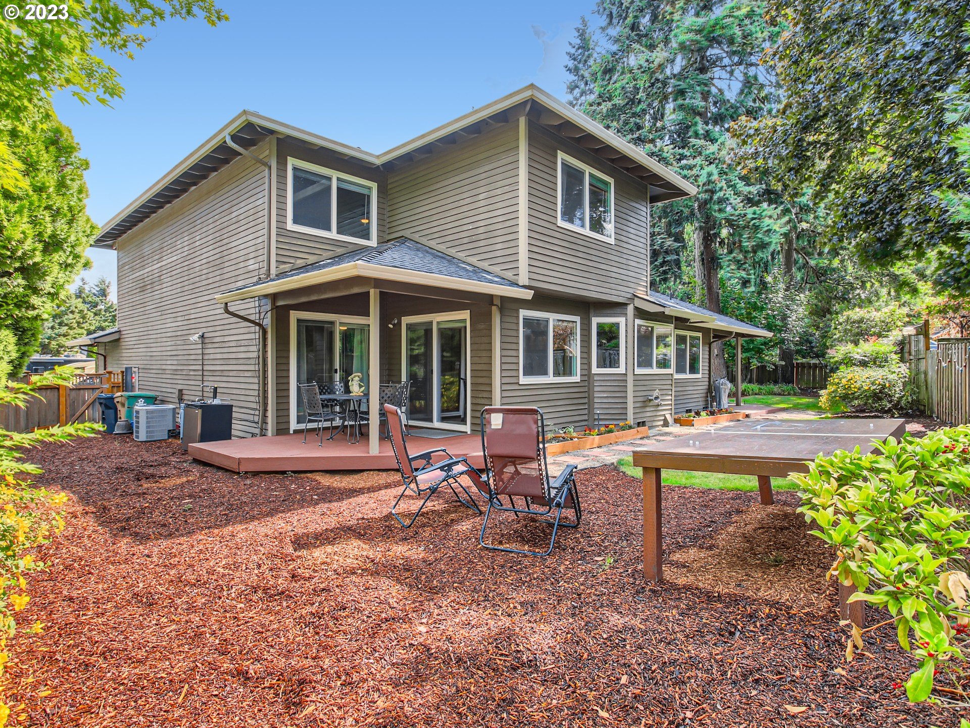 10230 Southwest Kickapoo Court Tualatin, OR 97062 - Photo 26 of 26 a front view of a house with swimming pool
