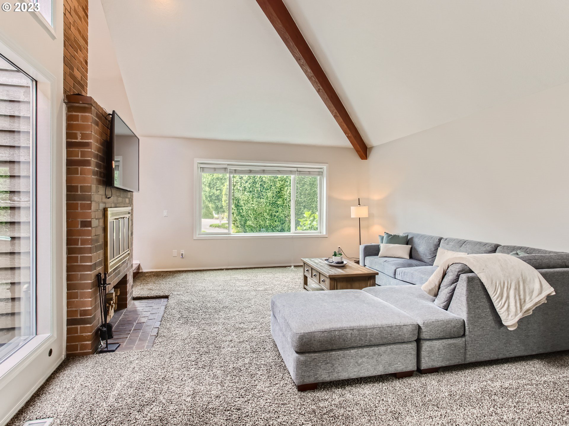10230 Southwest Kickapoo Court Tualatin, OR 97062 - Photo 6 of 26 a living room with furniture and a window