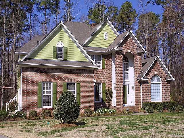 5500 Crossfield Drive Raleigh, NC 27613 - Photo 1 of 1 a front view of a house with garden