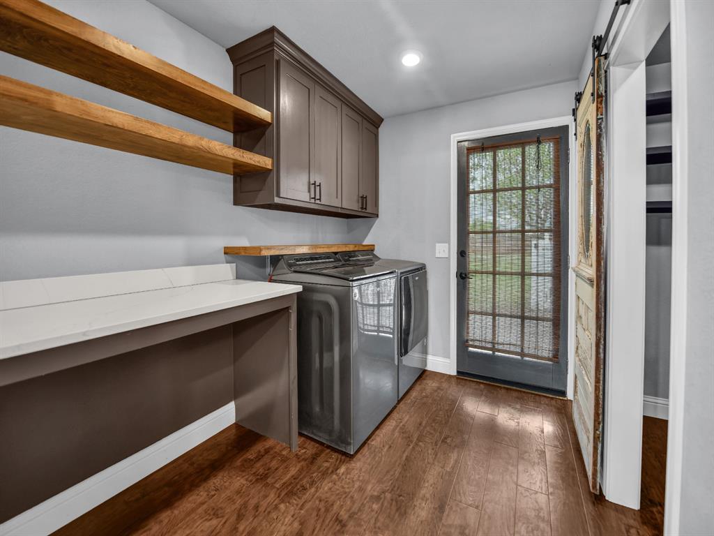 305 Gandy Street Lipan, TX 76462 - Photo 14 of 40 a view of a kitchen with electric appliances