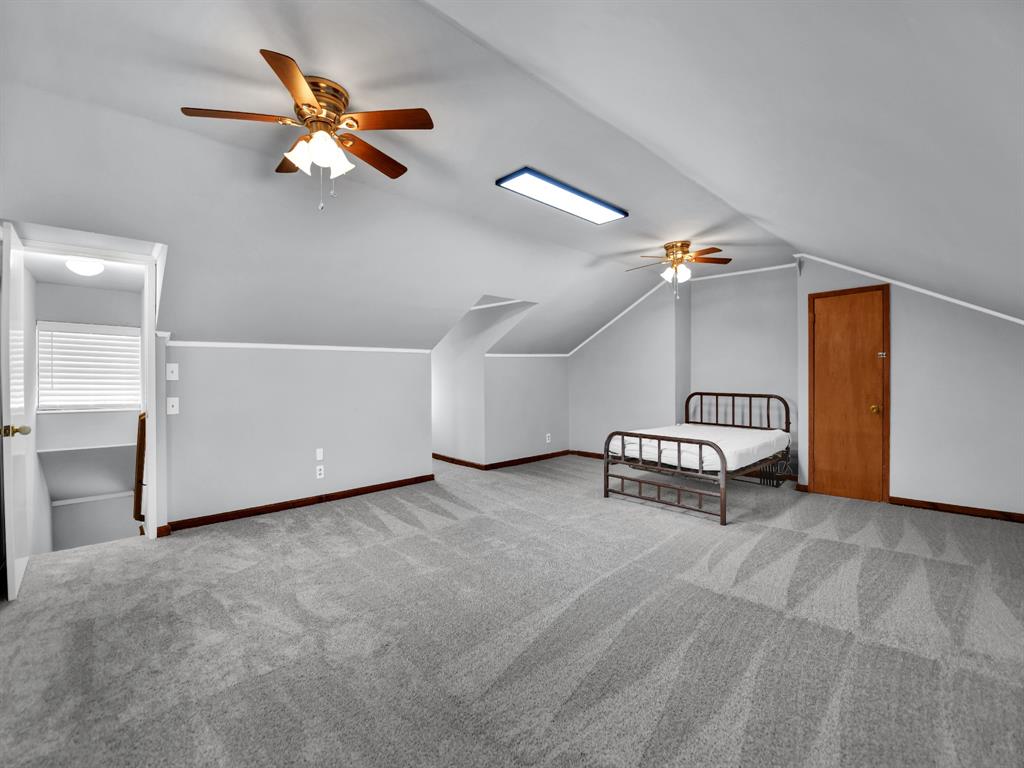 305 Gandy Street Lipan, TX 76462 - Photo 28 of 40 a view of a livingroom with furniture and a ceiling fan