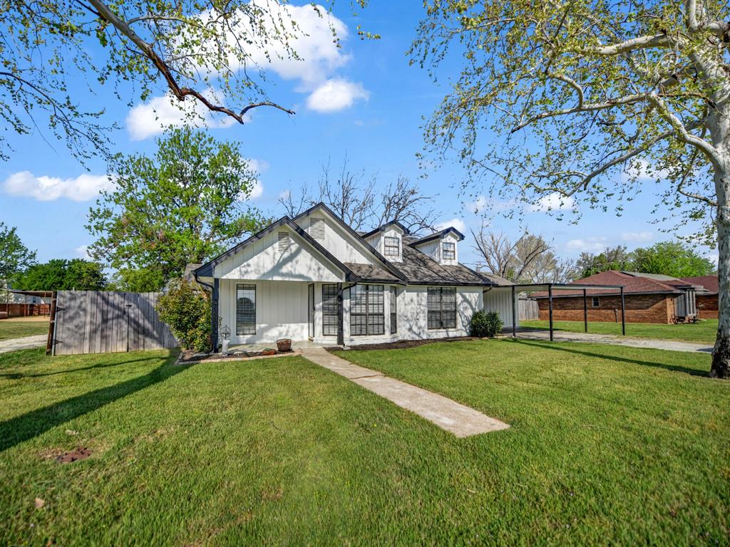 305 Gandy Street Lipan, TX 76462 - Photo 38 of 40 front view of a house with a yard