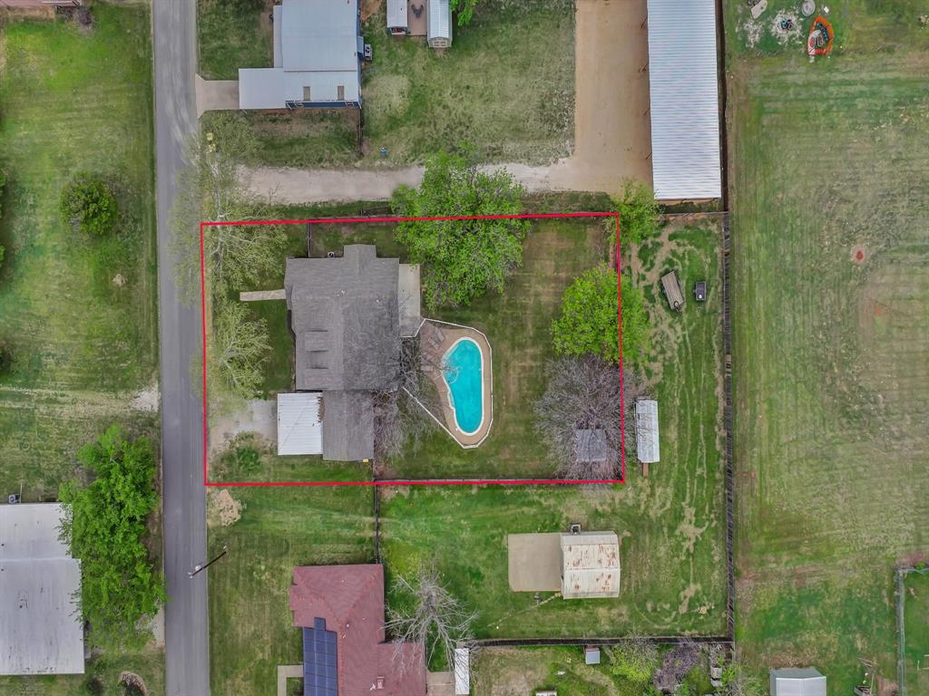 305 Gandy Street Lipan, TX 76462 - Photo 5 of 40 an aerial view of a house