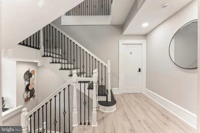 a view of a livingroom with furniture and windows