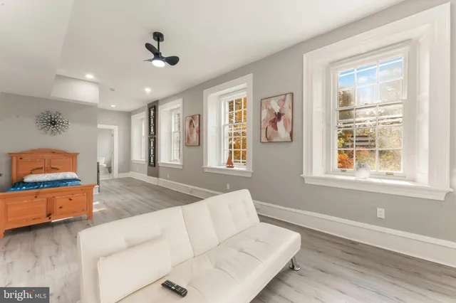 a bathroom with a glass shower door