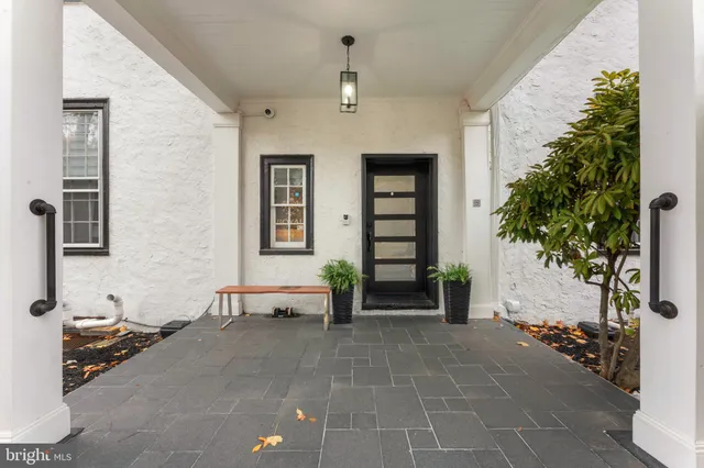 a view of hallway with wooden floor
