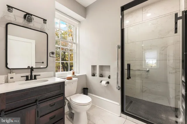 a workspace with furniture and a wooden floor