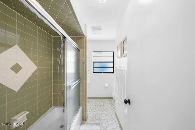 a bathroom with a bathtub