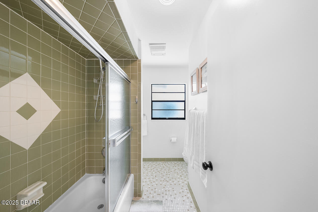 80 Cindy Lane Ponce Inlet, FL 32127 - Photo 29 of 45 a bathroom with a bathtub