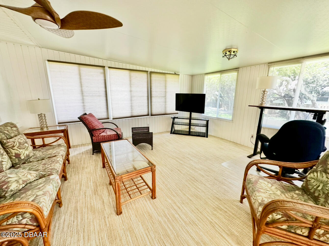 80 Cindy Lane Ponce Inlet, FL 32127 - Photo 38 of 45 a living room with furniture and a flat screen tv