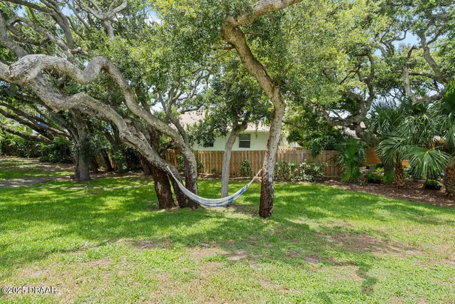 a view of a house with a park