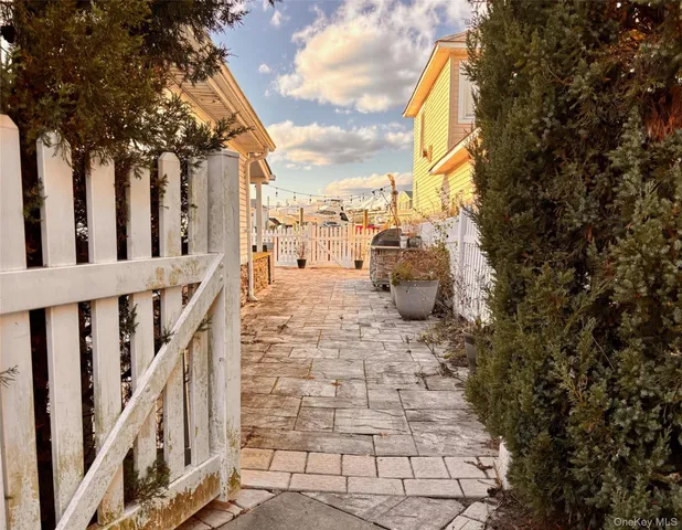a bathroom with a sink toilet and a mirror