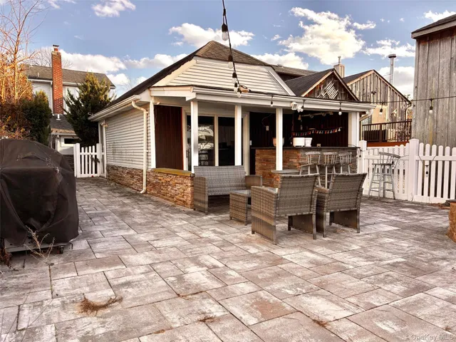a front view of a house with patio