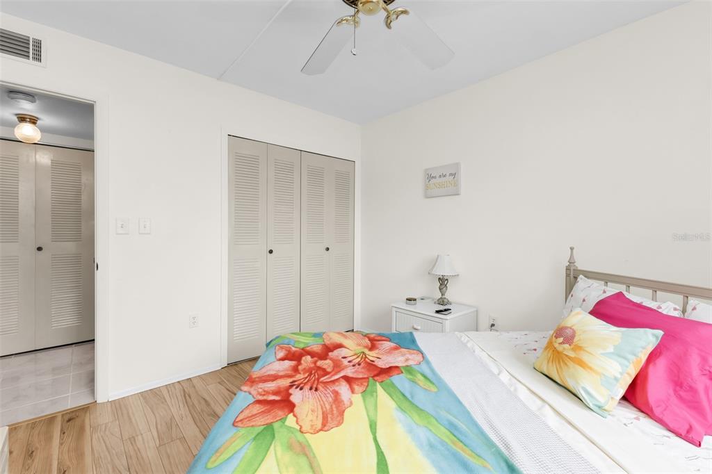 25225 Rampart Boulevard, Unit 1604 Punta Gorda, FL 33983 - Photo 22 of 41 a bedroom with a bed and a closet