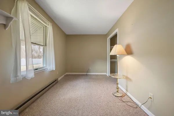 a view of a room with windows