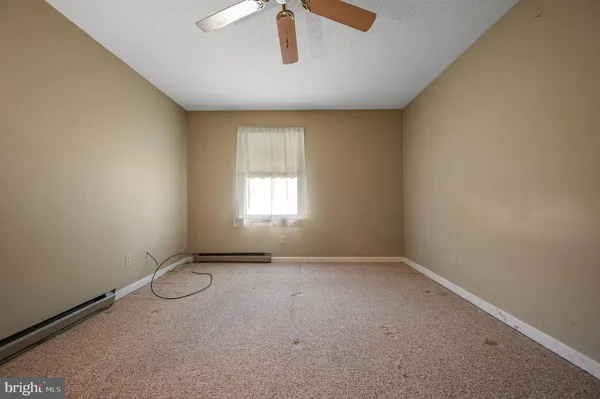 a view of a livingroom with a window