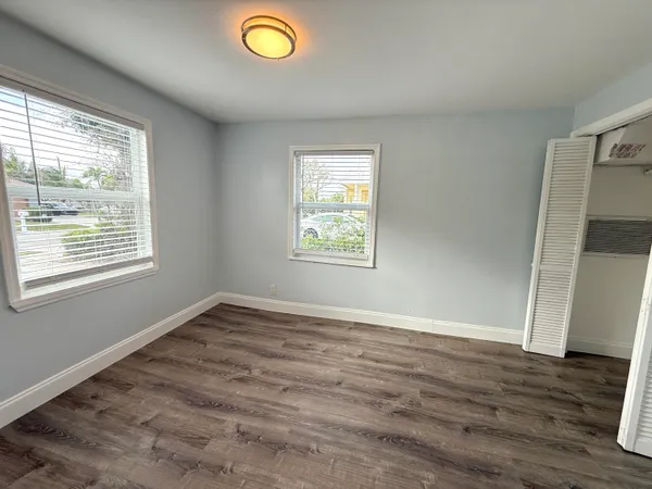 a view of an empty room and window