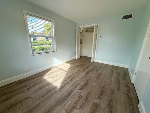 a view of an empty room and window