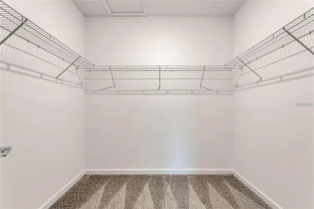 a view of a room with racks on the wall