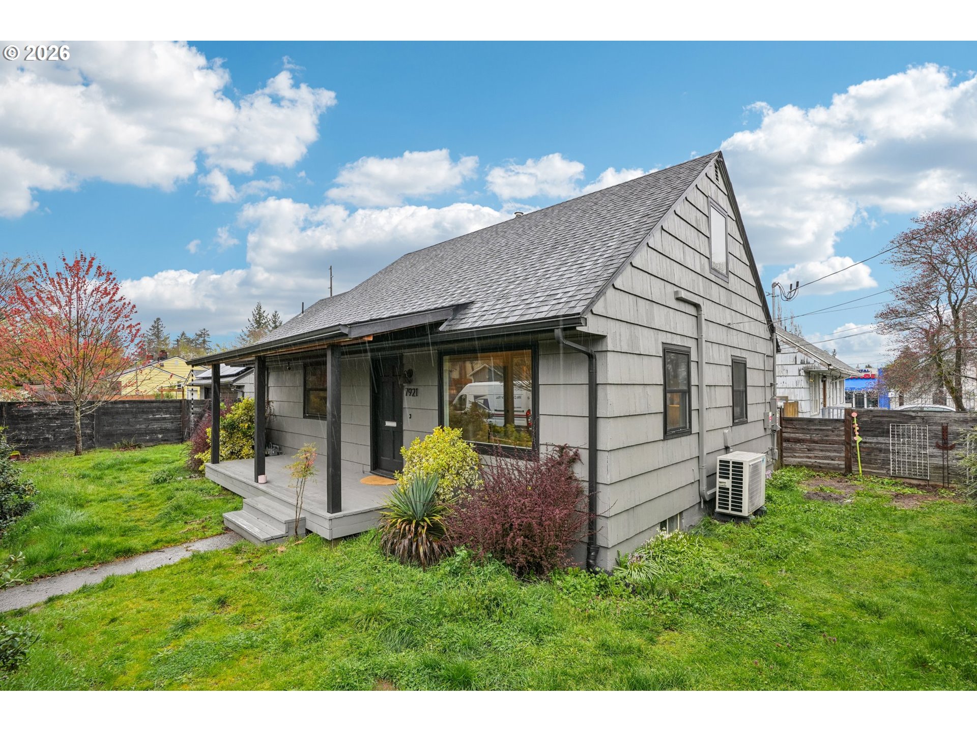 7921 Northeast Clackamas Street Portland, OR 97213 - Photo 2 of 31 a view of a house with a yard