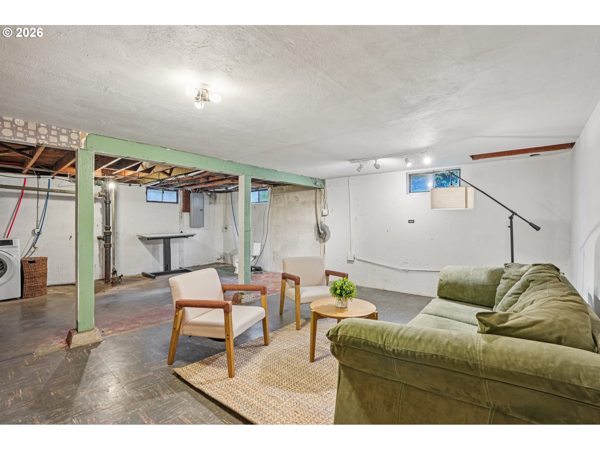 7921 Northeast Clackamas Street Portland, OR 97213 - Photo 24 of 31 a living room with furniture and wooden floor